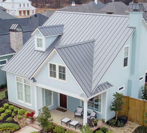 silver metal roof white house|houses with charcoal metal roof.